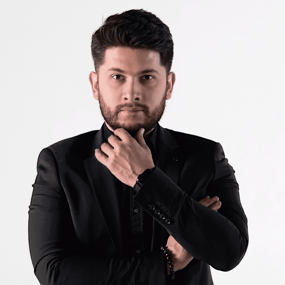 Алишер Отабаев